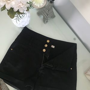 Black high waisted shorts.